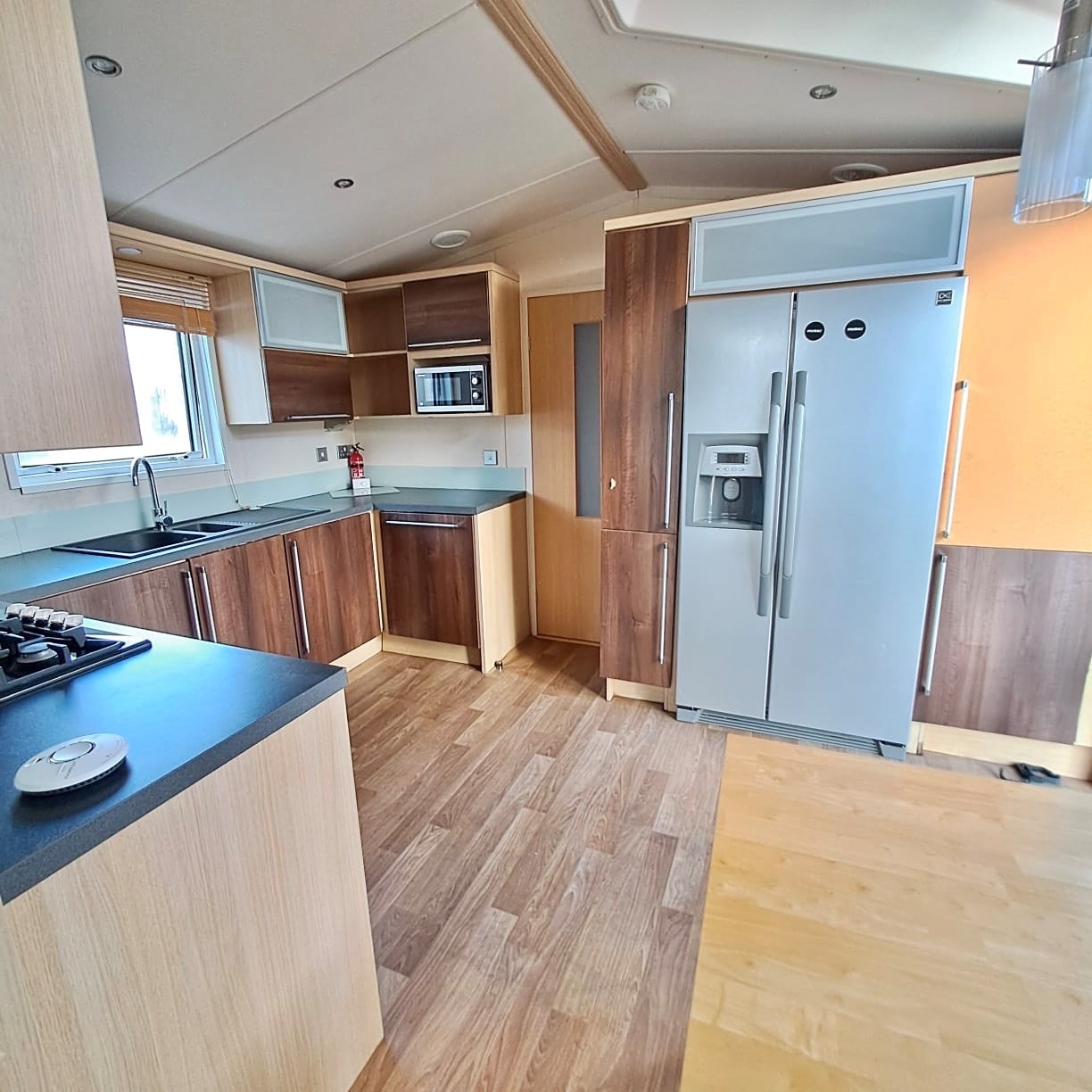 SWIFT CHAMPAGNE DELUXE WITH A BATH AND SHOWER, 40 X 13 WITH 2 BEDROOMS, FULL WINTER SPEC, DOUBLE PATIO DOORS BOTH ENTRANCES For Sale Thumb