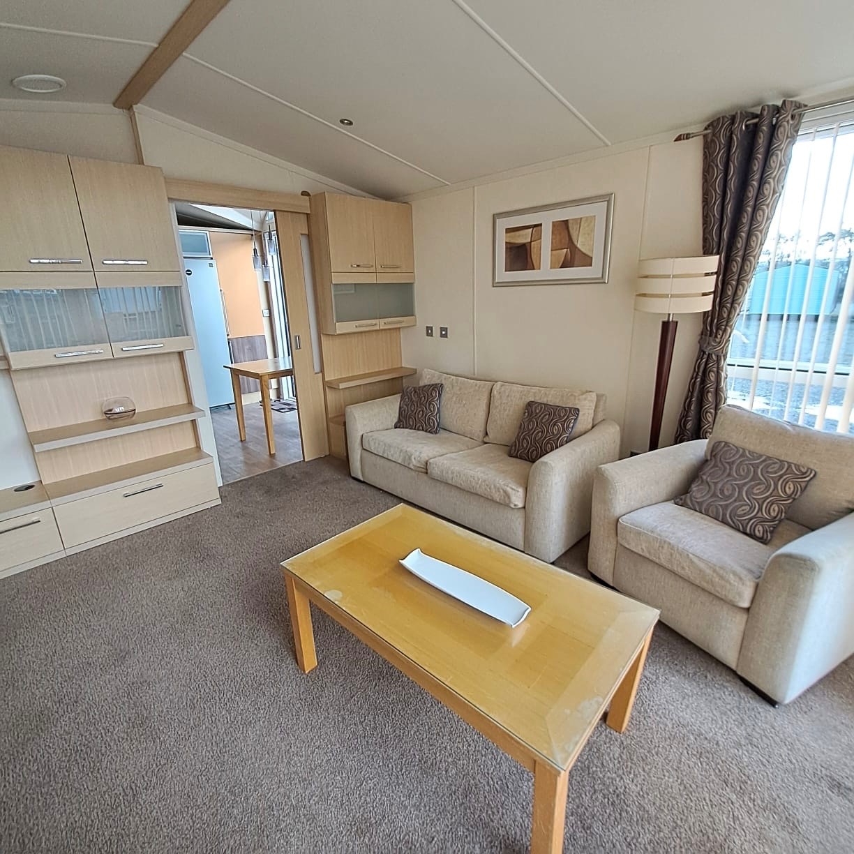 SWIFT CHAMPAGNE DELUXE WITH A BATH AND SHOWER, 40 X 13 WITH 2 BEDROOMS, FULL WINTER SPEC, DOUBLE PATIO DOORS BOTH ENTRANCES For Sale Thumb