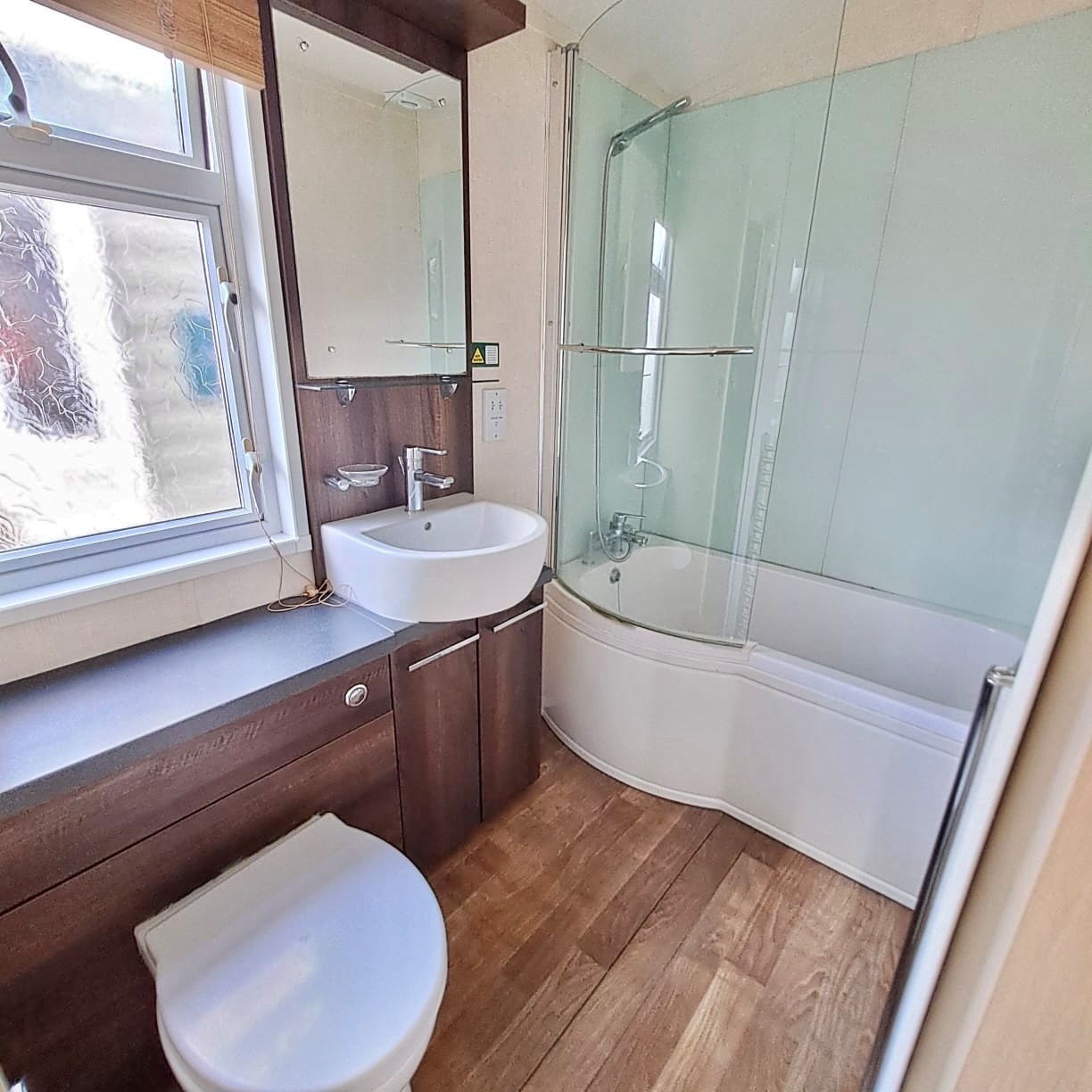 SWIFT CHAMPAGNE DELUXE WITH A BATH AND SHOWER, 40 X 13 WITH 2 BEDROOMS, FULL WINTER SPEC, DOUBLE PATIO DOORS BOTH ENTRANCES For Sale Thumb