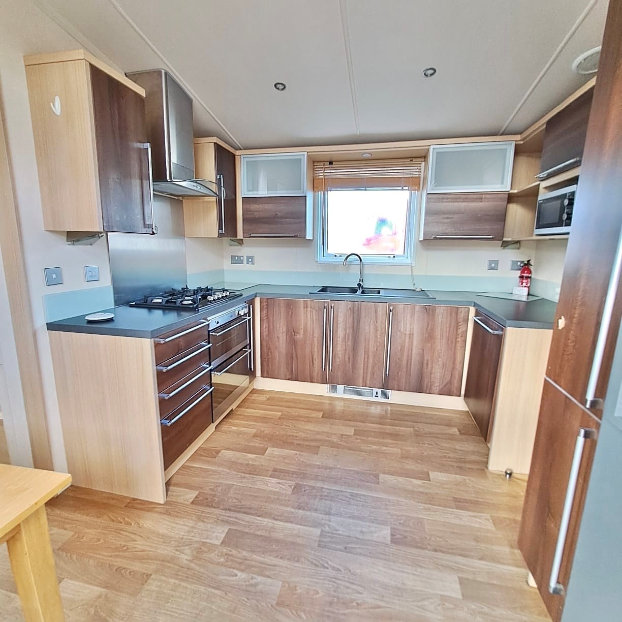 SWIFT CHAMPAGNE DELUXE WITH A BATH AND SHOWER, 40 X 13 WITH 2 BEDROOMS, FULL WINTER SPEC, DOUBLE PATIO DOORS BOTH ENTRANCES For Sale Thumb