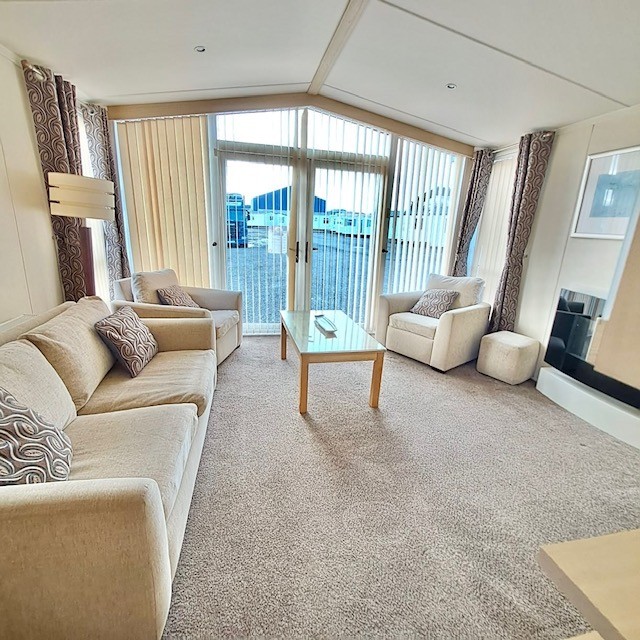 SWIFT CHAMPAGNE DELUXE WITH A BATH AND SHOWER, 40 X 13 WITH 2 BEDROOMS, FULL WINTER SPEC, DOUBLE PATIO DOORS BOTH ENTRANCES For Sale Thumb