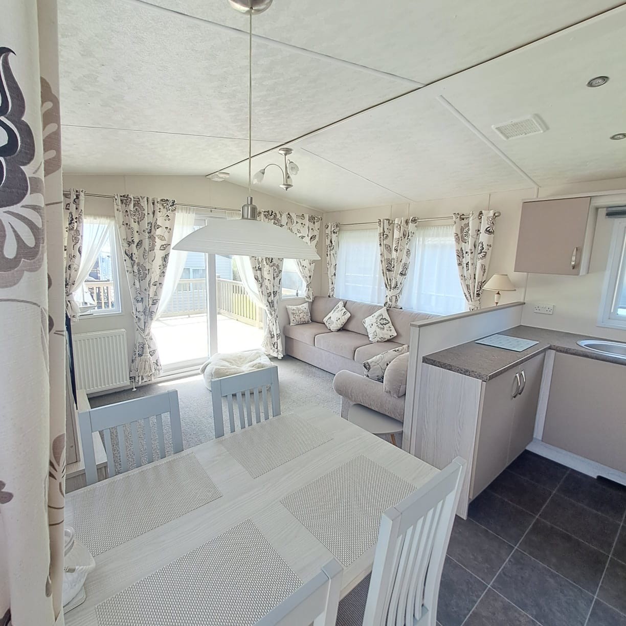 DELTA OCEAN 'LODGE' BY DELTA 38 X 12 WITH 2 BEDROOMS, PATIO DOORS, DOUBLE GLAZING & CENTRAL HEATING, ENCLOSED FRONT DECKING WITH PORCH INCLUDED For Sale Thumb